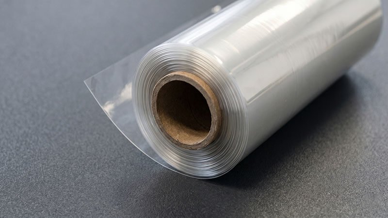 Transparent release liner roll on a cardboard core after storage